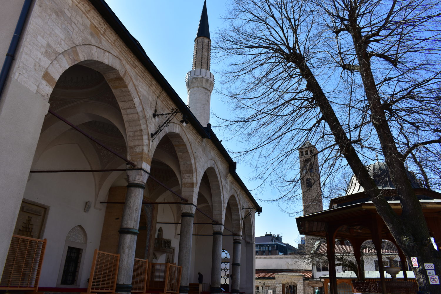 Gazi Husrev-beg Mosque minaret and clock tower in Sarajevo during a Sarajevo Insider tour